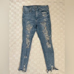 Light blue ripped jeans